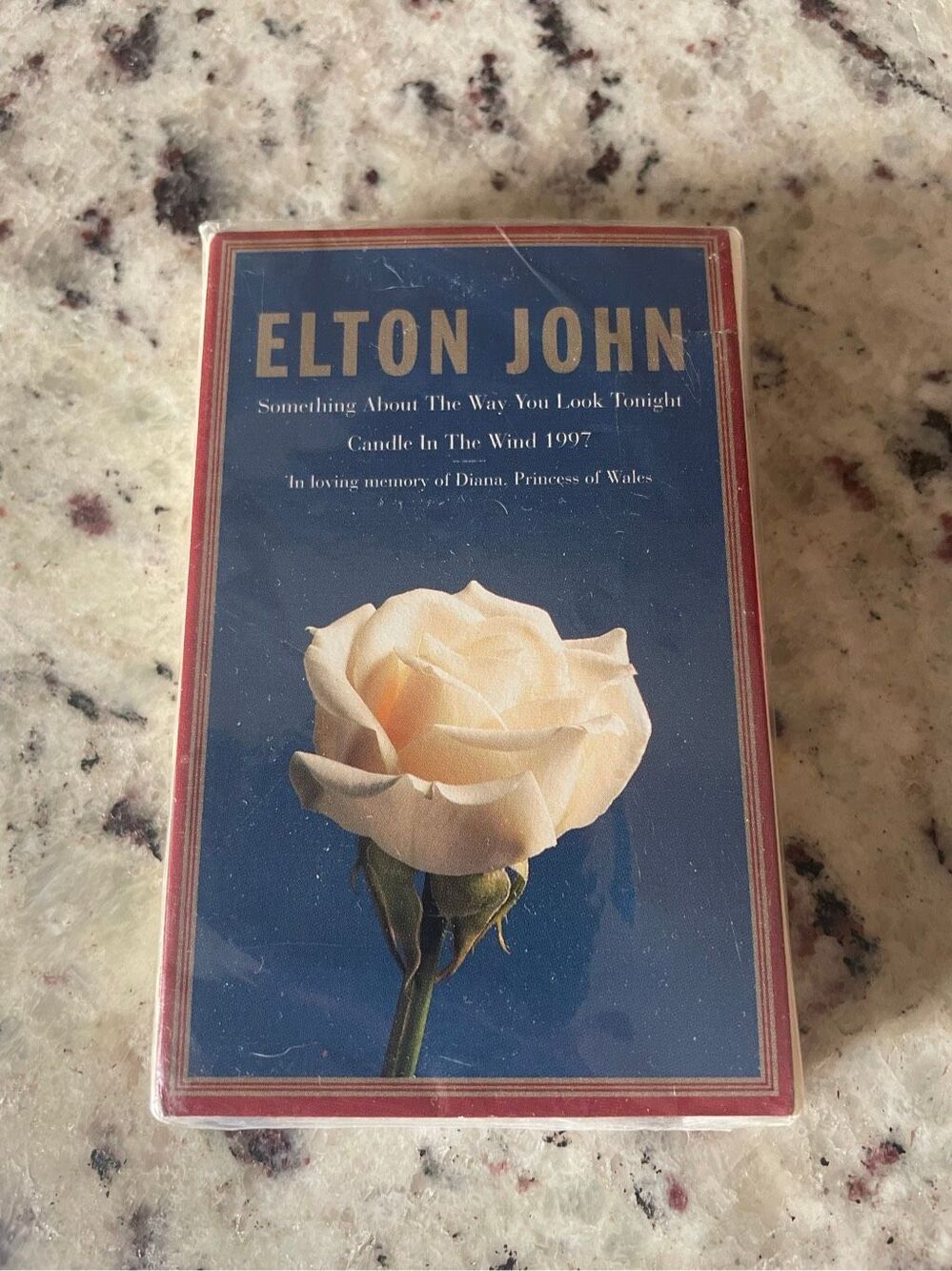 Elton John -  "Candle in the Wind 1997" and "Something About the Way You Look To